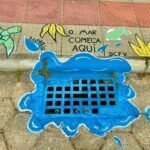 Crianças pintam bueiros com mensagens de preservação ambiental em Grão-Pará