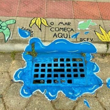 Crianças pintam bueiros com mensagens de preservação ambiental em Grão-Pará Crianças pintam bueiros com mensagens de preservação ambiental em Grão-Pará