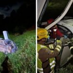 Motorista fica preso às ferragens após carro cair em ribanceira de cerca de 20 metros